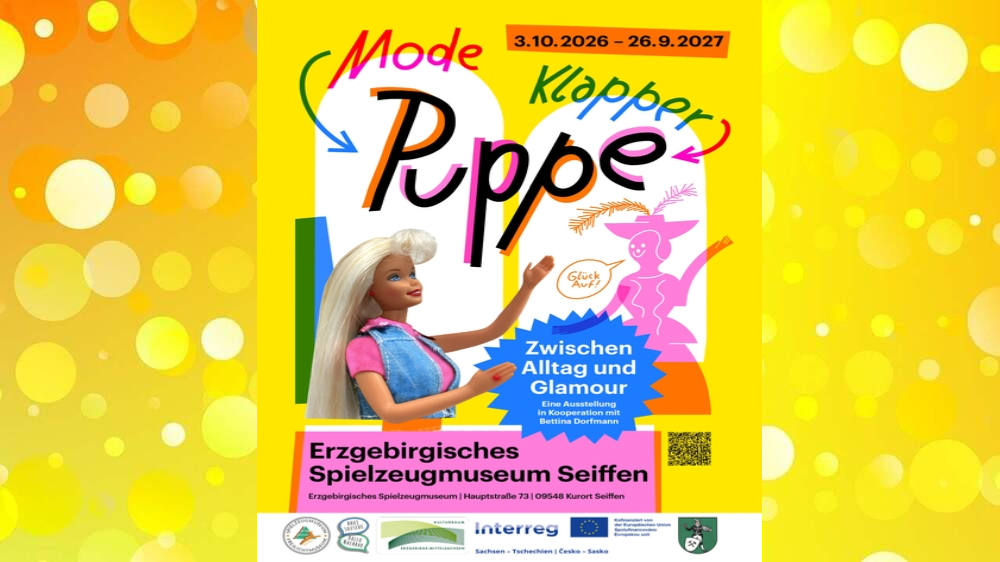 Sonderaustelleun Mode- Klapper- Puppe. Plakatfoto: Touristinformation Seiffen